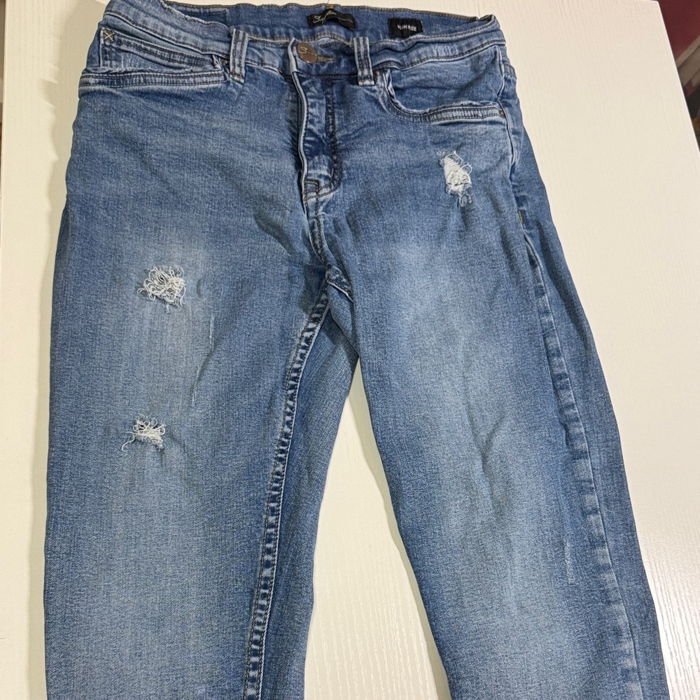 Distressed Blue Jeans
